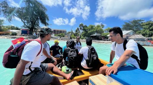 Members of KIRIMAT aboard a boat during a simulation exercise conducted in South Tarawa, Kiribati. Photo: WHO/Sean Casey